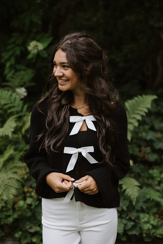 Black Sweater with White Bows