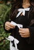 Black Sweater with White Bows