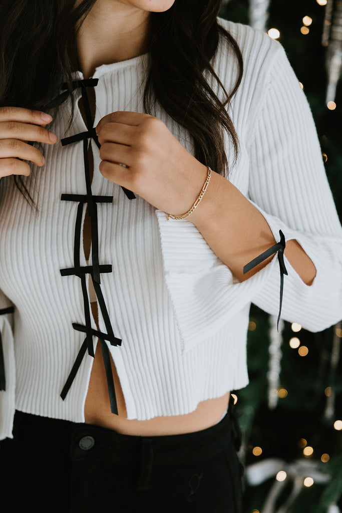 Ribbed Sweater With Black Bows