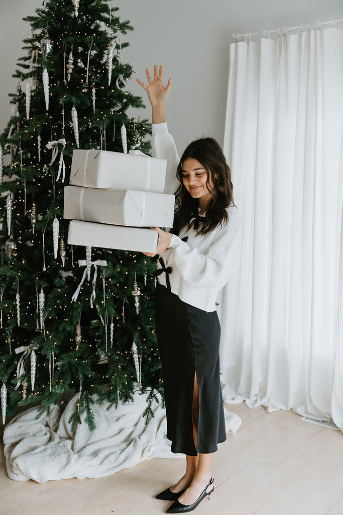 White Sweater with Black Bows