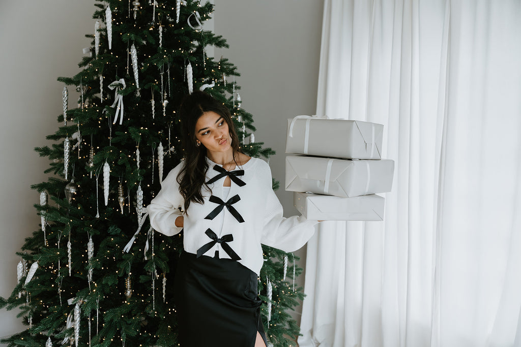 White Sweater with Black Bows