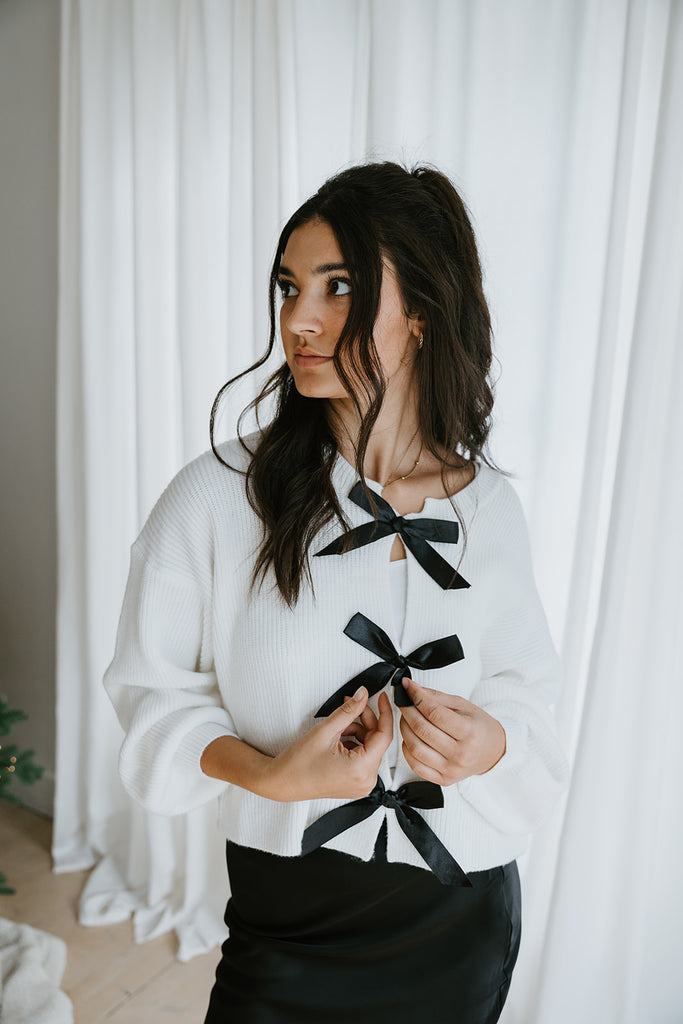 White Sweater with Black Bows